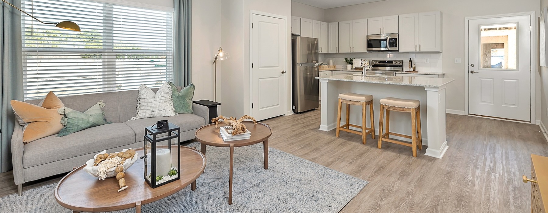 a living room with a couch and a table